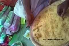 Writing on rice with turmeric